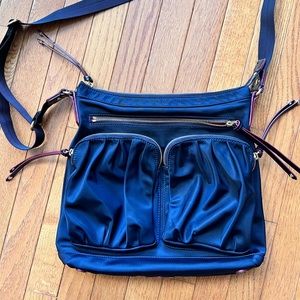 MZ Wallace black crossbody bag. Black with red interior.  Used only once